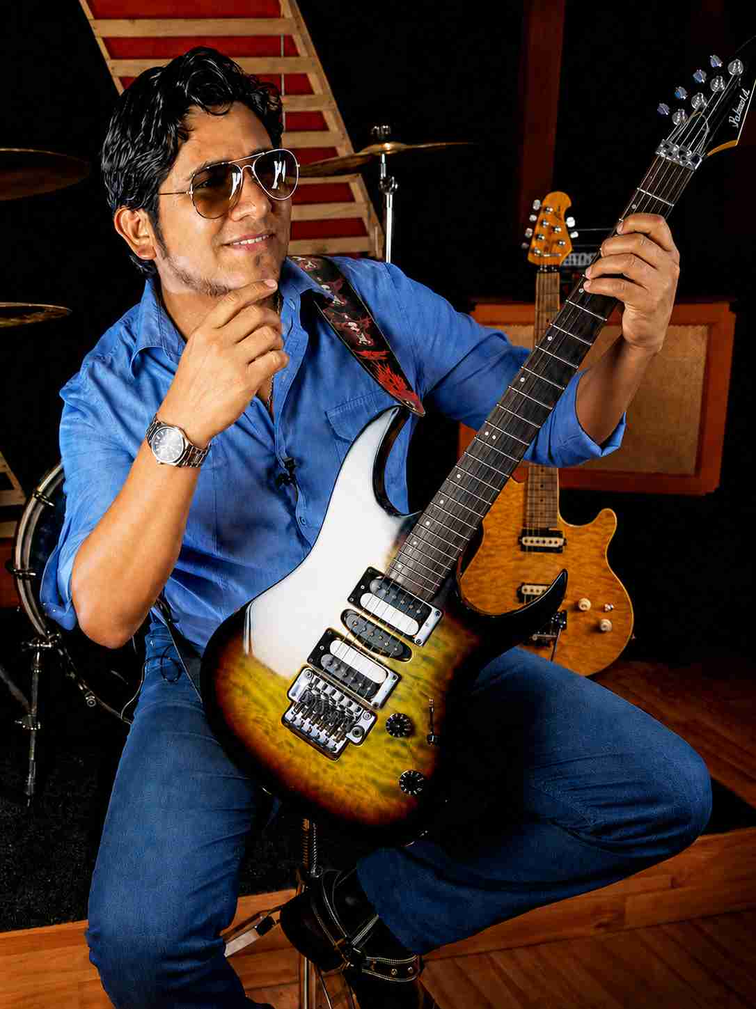 Val Staccato Peruvian instrumental guitarist composer thinking creative process recording studio Lima Peru aviator sunglasses