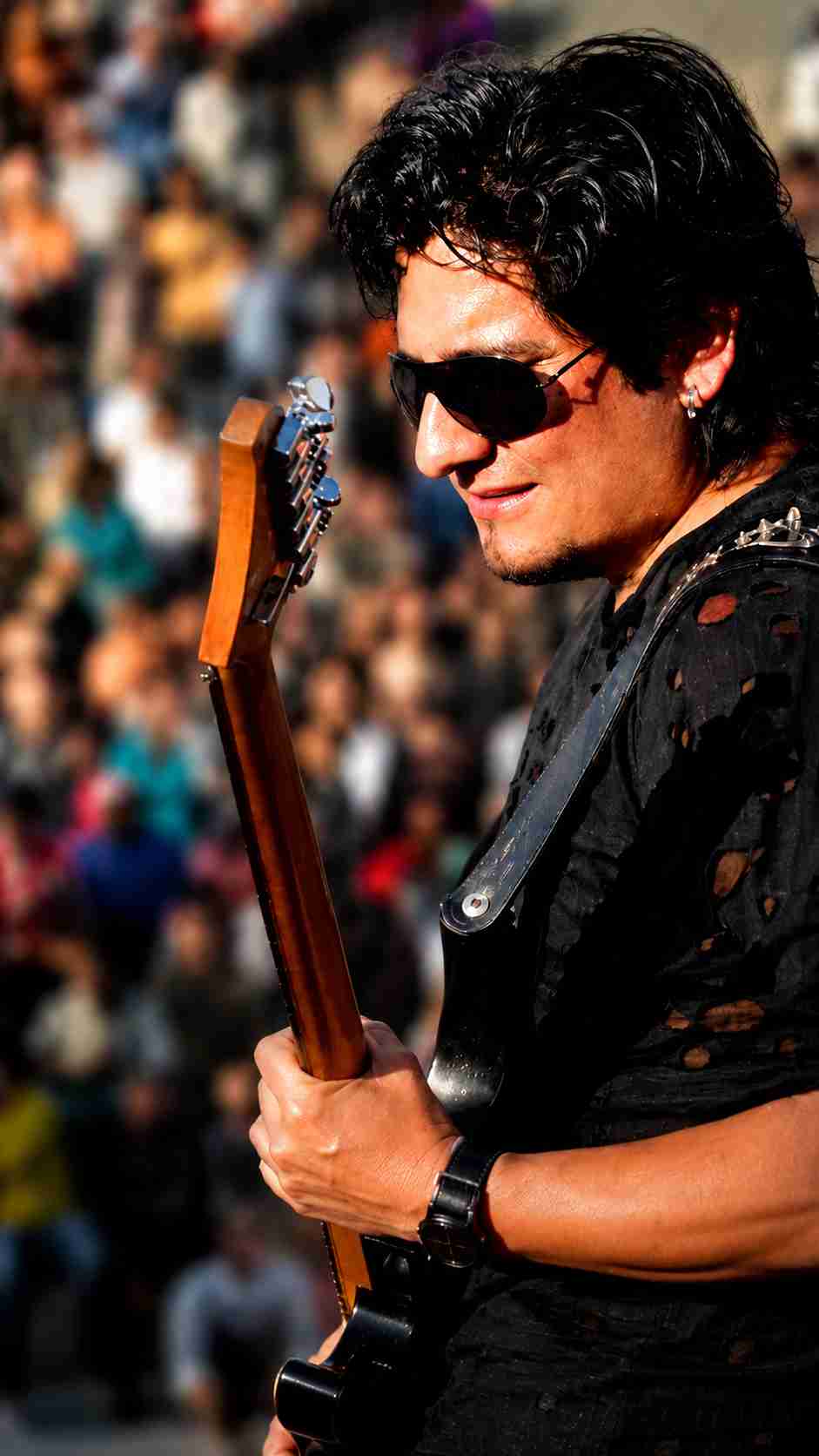 Val Staccato Peruvian instrumental rock guitarist performing live before a crowd in Lima Peru